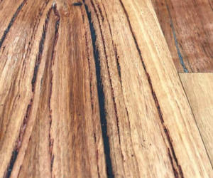 Book matched reclaimed hardwood with an oil finish Recycled Timber Innovations
