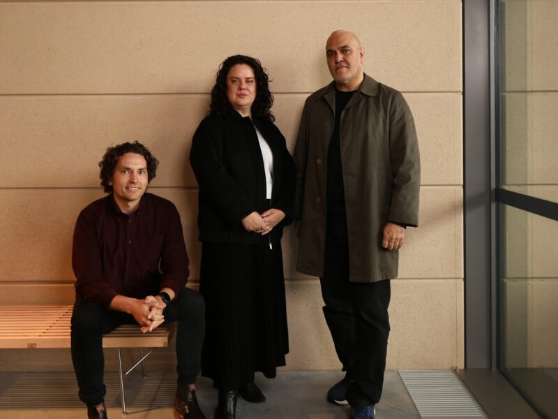 Creative Directors left to right: Jack Gillmer-Lilley, Emily McDaniel and Michael Mossman in the Chau Chak Wing Museum, University of Sydney. Photographer: Hannah Walker.