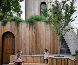 Vertical timber panelling envelops the rear courtyard, photographed for green magazine issue 91: Lit Up by Derek Swalwell.
