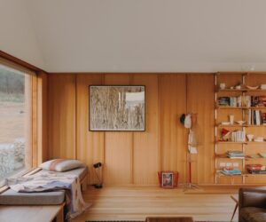 A spacious interior with few large furniture pieces and simple storage for holiday clutter, photographed for green magazine issue 105: High and Dry by Tim Clark Studio.