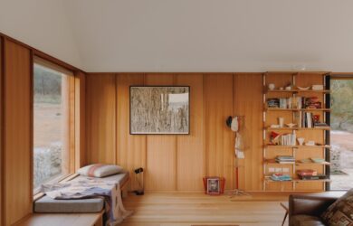 A spacious interior with few large furniture pieces and simple storage for holiday clutter, photographed for green magazine issue 105: High and Dry by Tim Clark Studio.