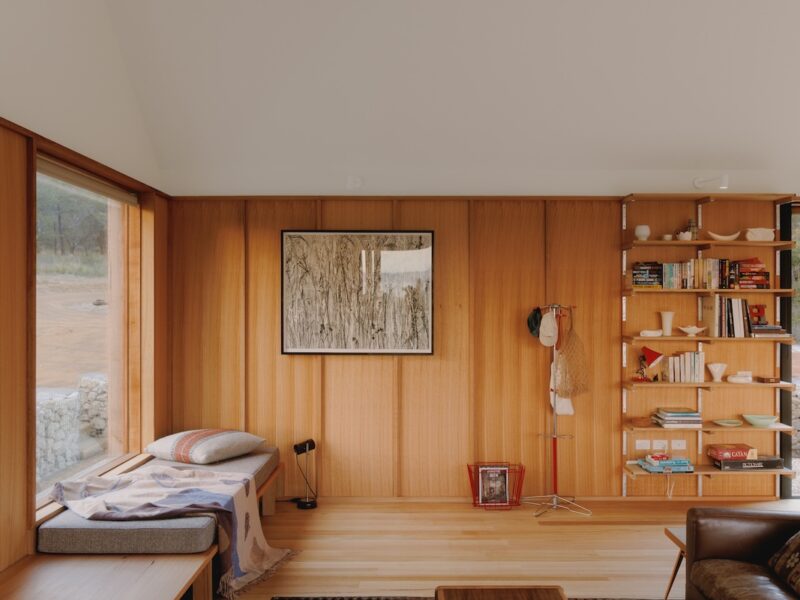 A spacious interior with few large furniture pieces and simple storage for holiday clutter, photographed for green magazine issue 105: High and Dry by Tim Clark Studio.