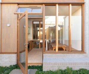 Built-in brick seat connects rear façade of terrace house with courtyard, photographed for green magazine issue 105: Southern Calm by Joanne Ly.