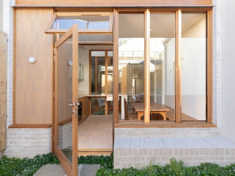 Built-in brick seat connects rear façade of terrace house with courtyard, photographed for green magazine issue 105: Southern Calm by Joanne Ly.