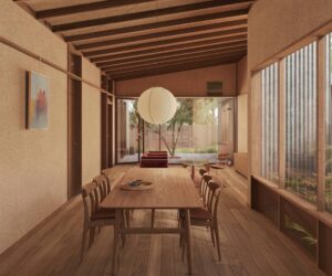 Interior view of Lomandra showing exposed hempcrete walls, timber joinery and a flexible open-plan layout, photographed for green magazine eNews.