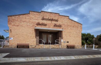 Guildford Public Hall exterior with restored brick façade and entry steps, photographed by Rhiannon Slatter.
