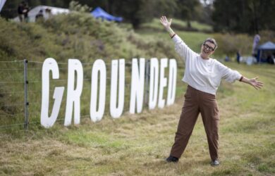 GROUNDED 2025 - Tracey at GROUNDED sign