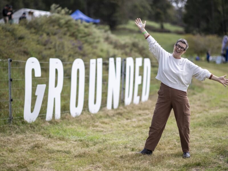 GROUNDED 2025 - Tracey at GROUNDED sign