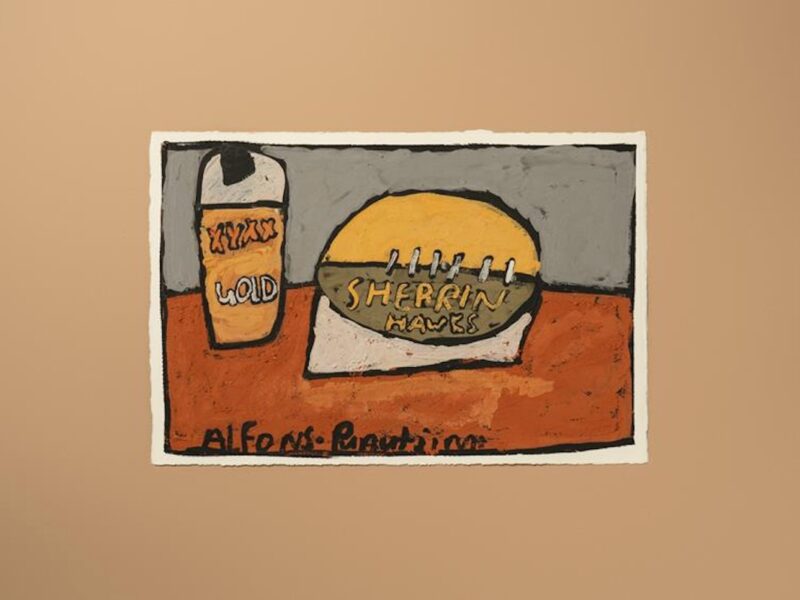Painting of a football and drink bottle with “Sherrin” branding, representing Australian Rules Football. Artist is Alfonso Puautjimi (Ngaruwanajirra Arts), Gold and Hawkes Football, 2025. Photo by Connor Patterson.