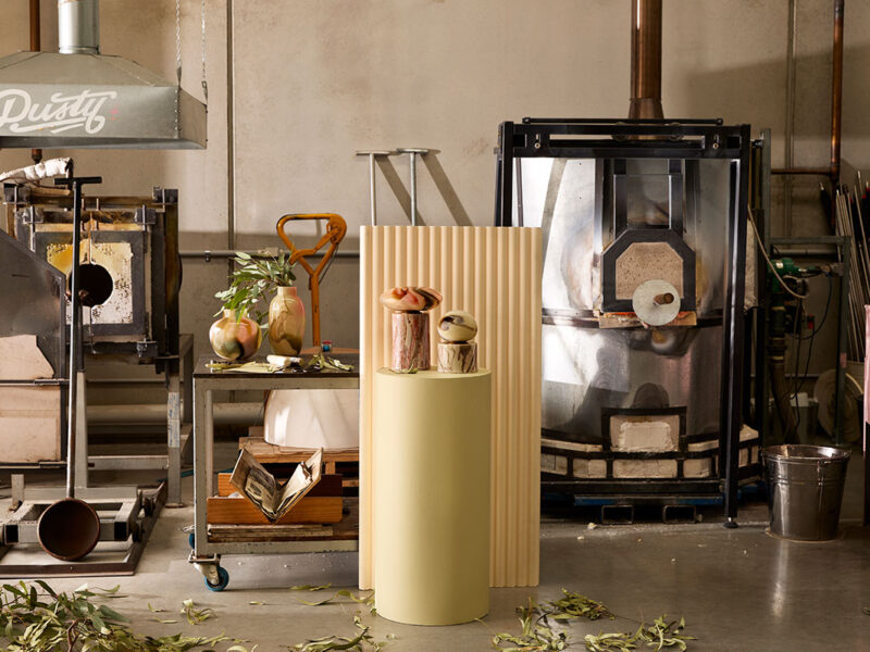 Handcrafted ceramic and glass objects by Robert Gordon and HotHaus Glass Studio displayed inside a workshop during the Hand of the Maker exhibition at Melbourne Design Week 2026. Photo by Martina Gemmola.